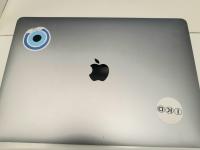 CS1910/2025 MacBook Pro with stickers